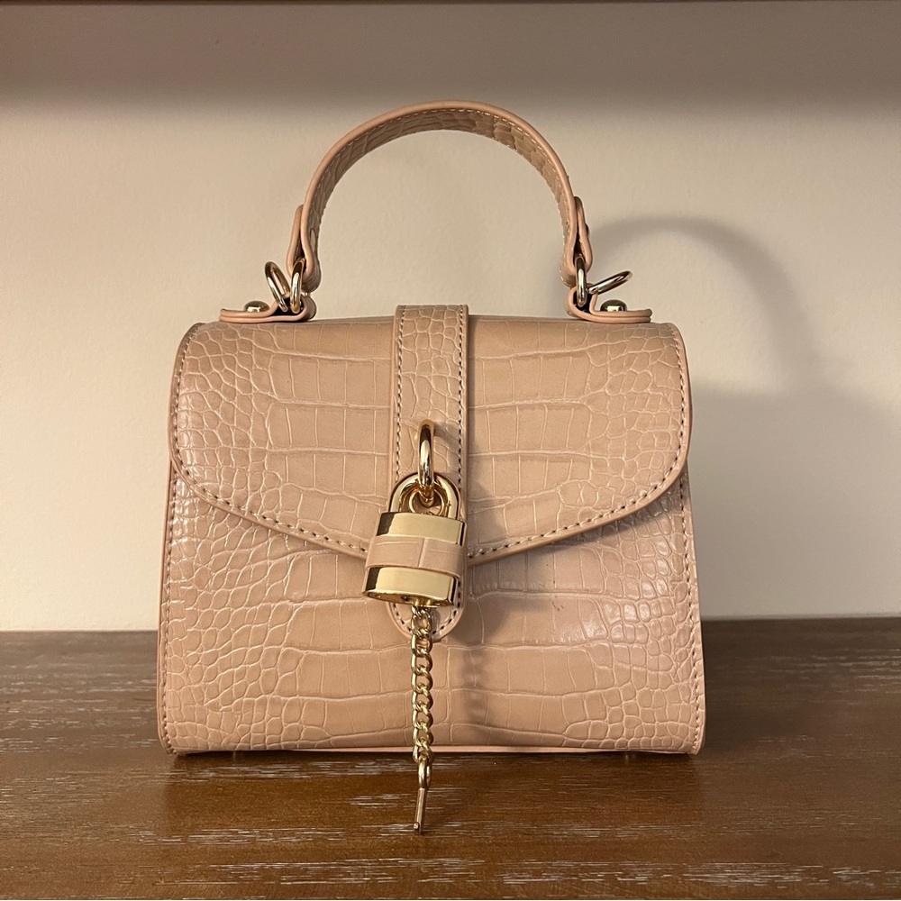 Beige faux alligator skin handbag